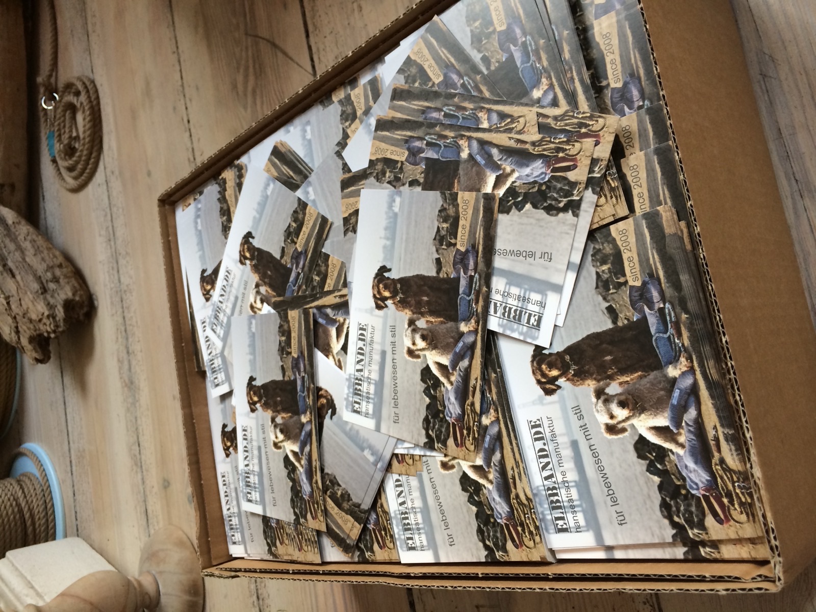 The first Elbband postcards in a box